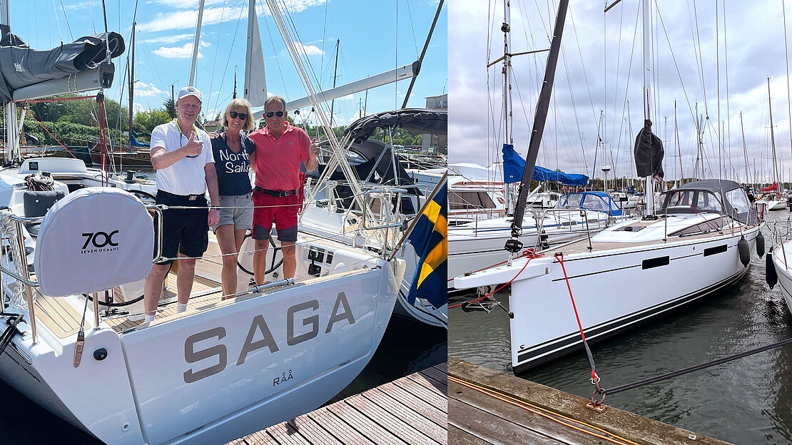 Saga sailing yacht at dock with owners and friend on deck giving a thumbs up