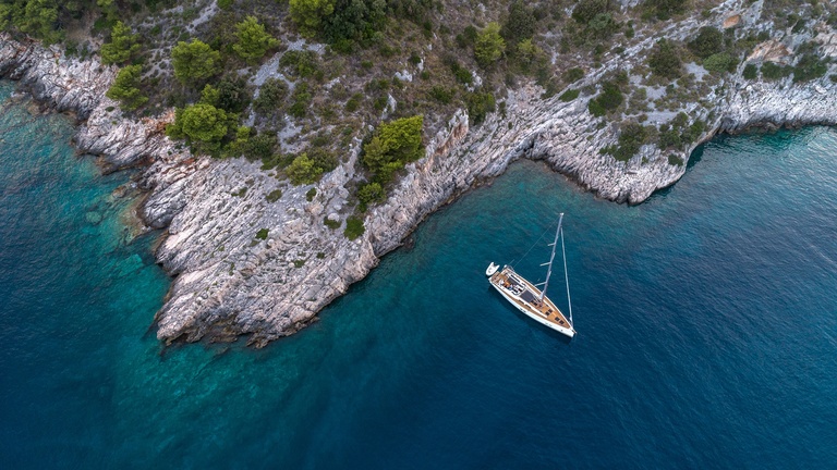 Hanse yacht at anchor off the coast of Turkish sailing vacation destination