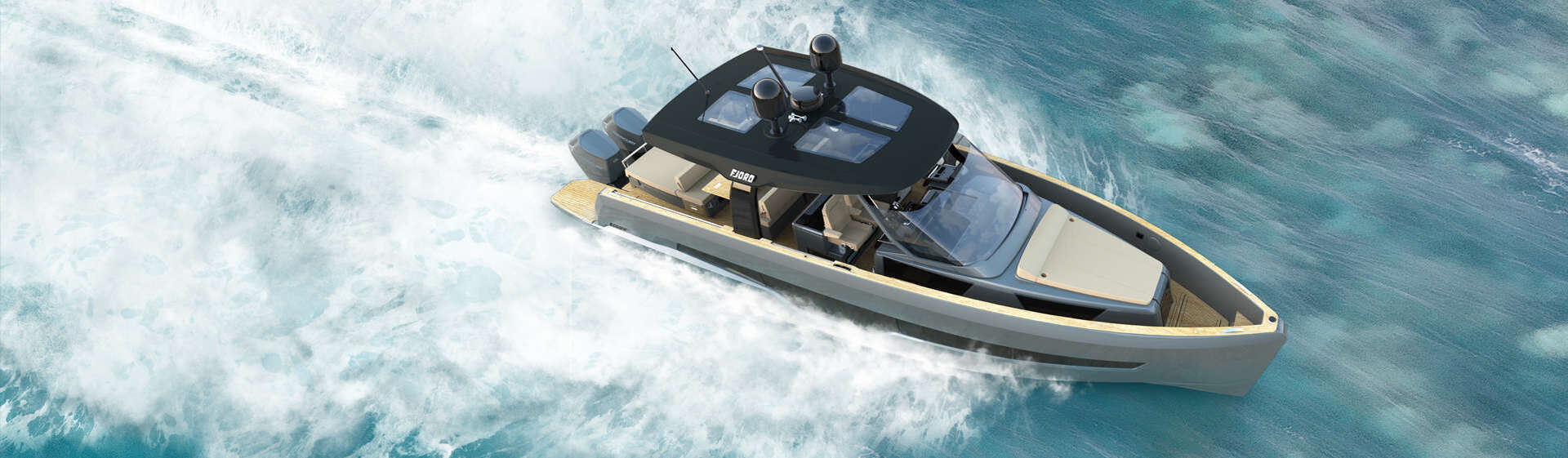 Fjord 41 XP races near coastline with powerful twin v12 600 hp outboard motors
