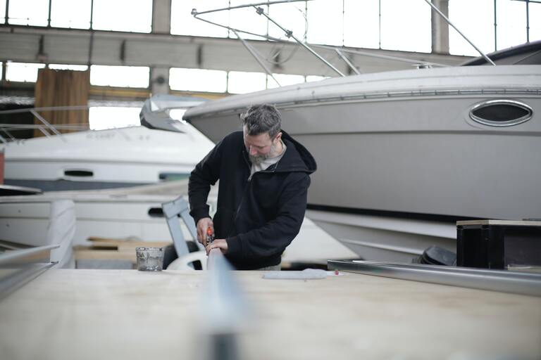 Man working on boat