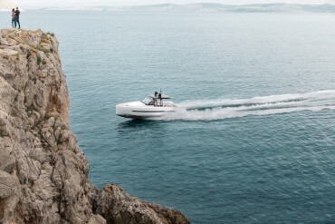 Aerial view of a moving FJORD 44 open power yacht