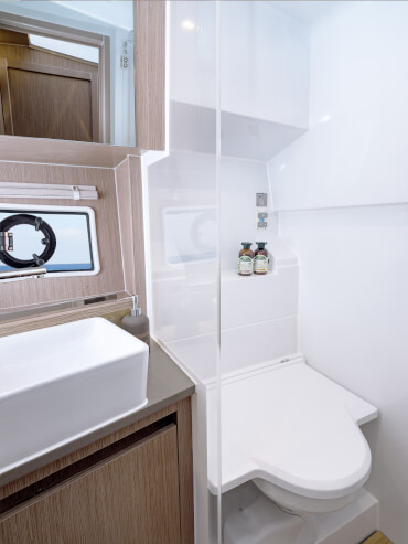 Bathroom of the motor yacht with outboard engine