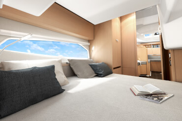 motorboat, interior, bed, berth, window, natural light, guest cabin