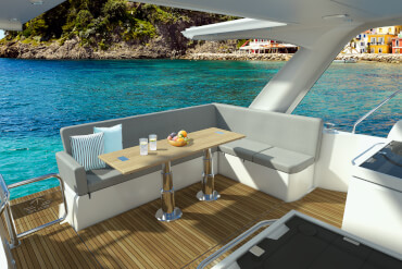 Comfortable sofa with adjustable cushions in the aft of a motor yacht