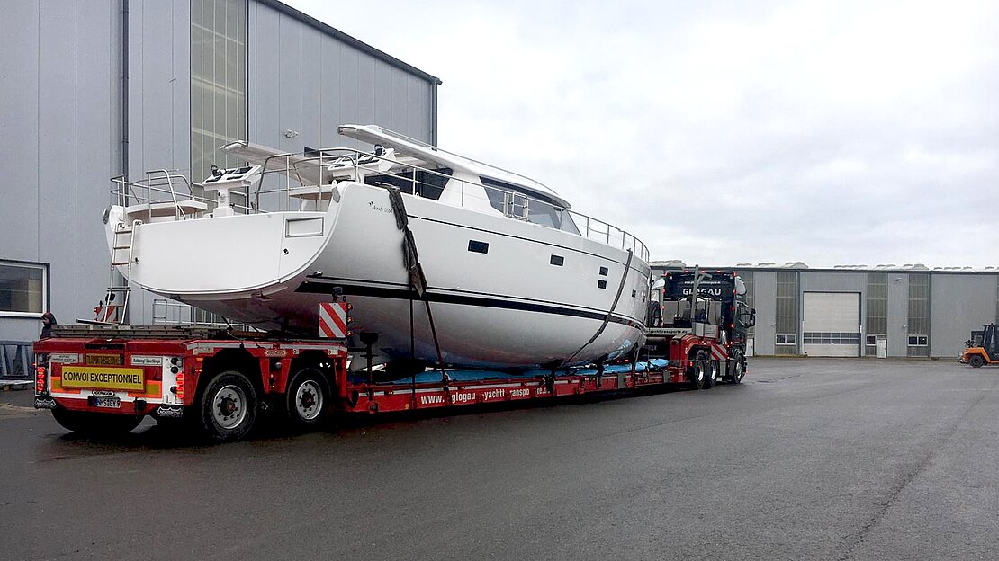 Moody yacht arrives at port warehouse on special yacht trailer