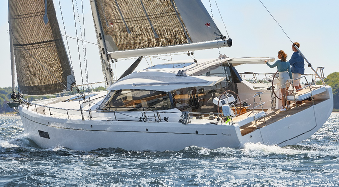 Sailing yacht owners experience summer sailing fun