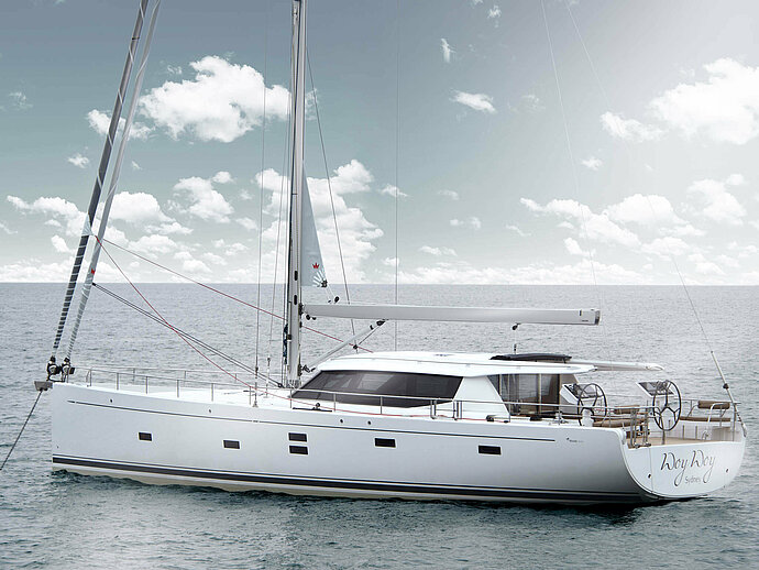 Moody Decksaloon 54 sits at anchor on flat picturesque ocean